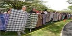 Record for longest chain of knotted sarongs set at inaugural Mosque Family Day